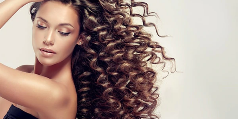 Can you use a straightener on permed hair online